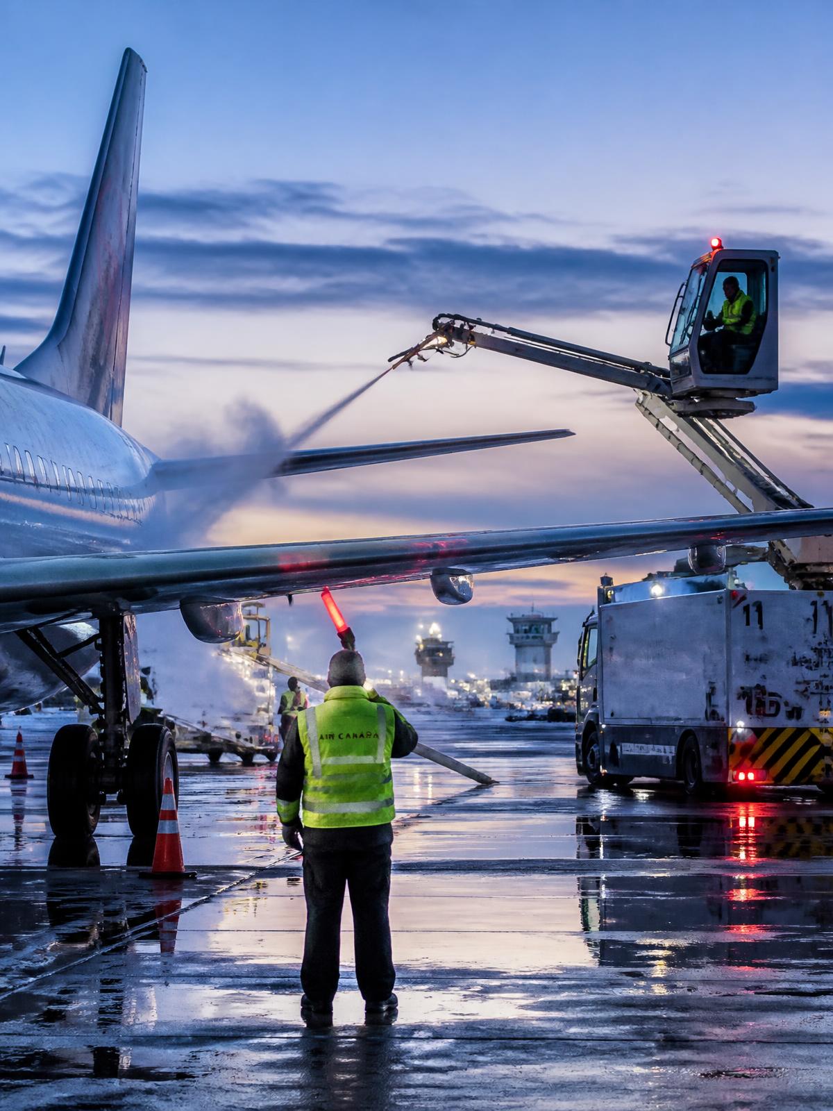 Inland aviation fueler refuelling an aircraft on the ramp at dawn